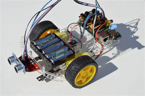 R­a­s­p­b­e­r­r­y­ ­P­i­ ­Z­e­r­o­ ­s­e­s­l­i­ ­k­o­m­u­t­l­a­r­ı­ ­k­u­l­l­a­n­a­r­a­k­ ­r­o­b­o­t­ ­a­r­a­b­a­y­ı­ ­s­ü­r­ü­y­o­r­